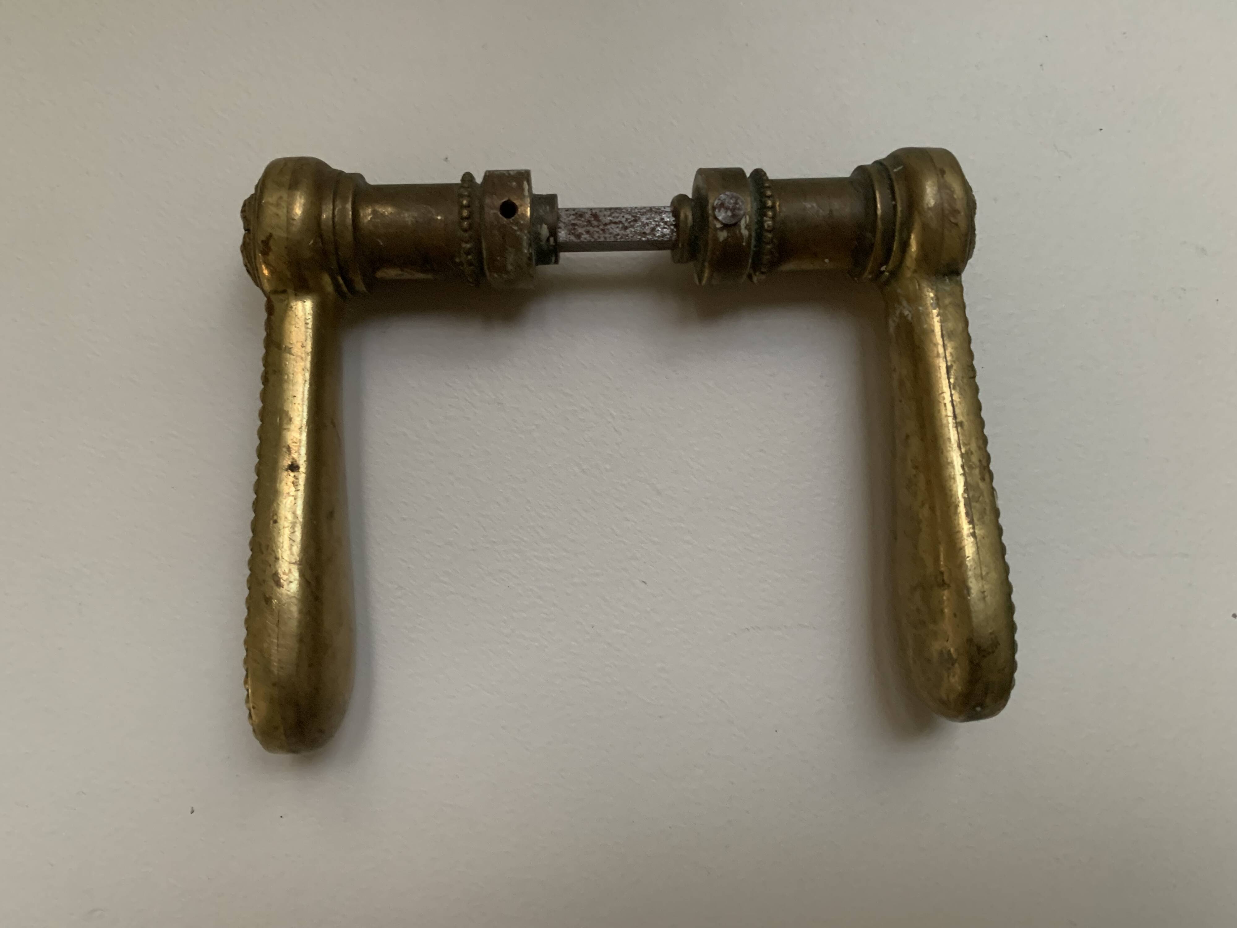 Old brass door handles