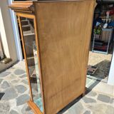 Showcase bookcase in molded and carved walnut