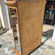 Showcase bookcase in molded and carved walnut