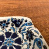 Vintage handmade blue ceramic ashtray with deer and flower ornament from Rodos Ceramics.