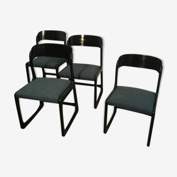 4 black Baumann sled chairs