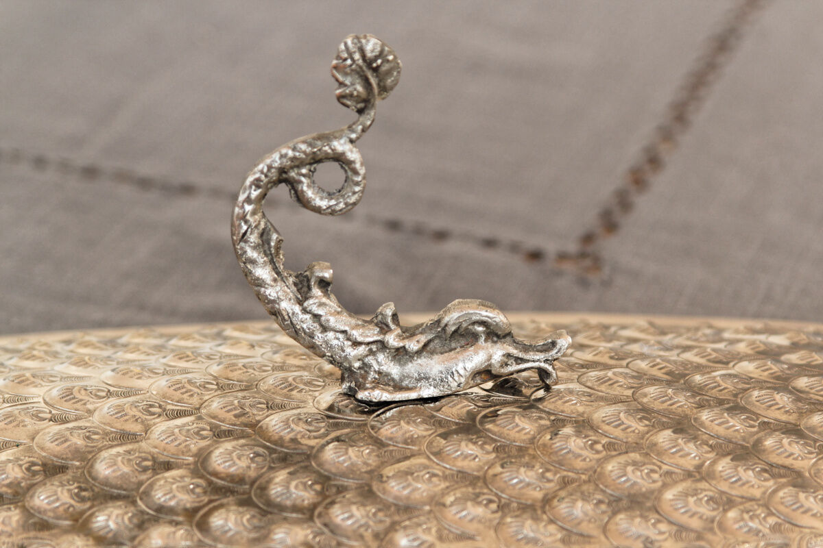 Ancient fish dish in silver metal