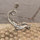 Ancient fish dish in silver metal