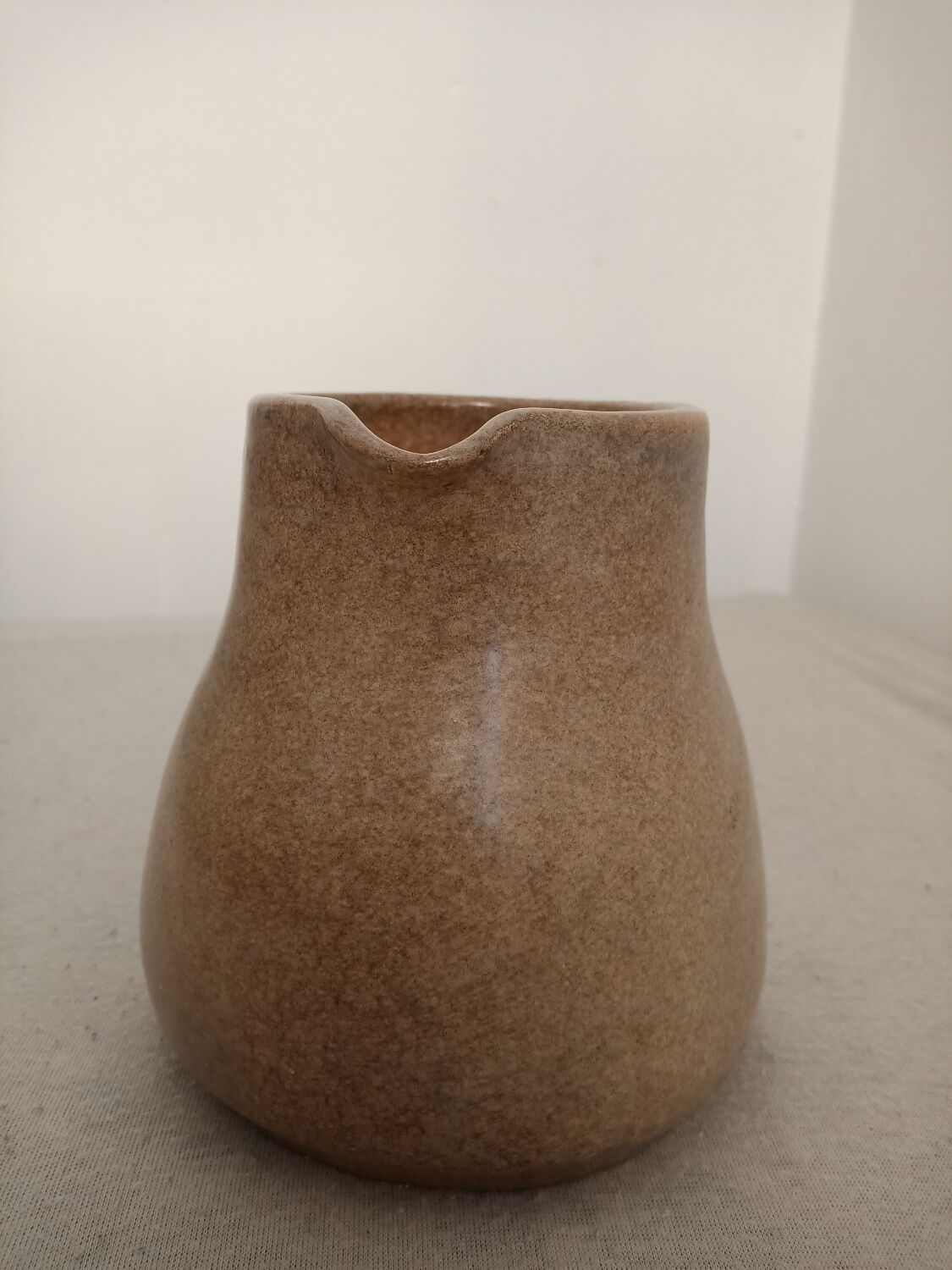 Signed stoneware milk jug