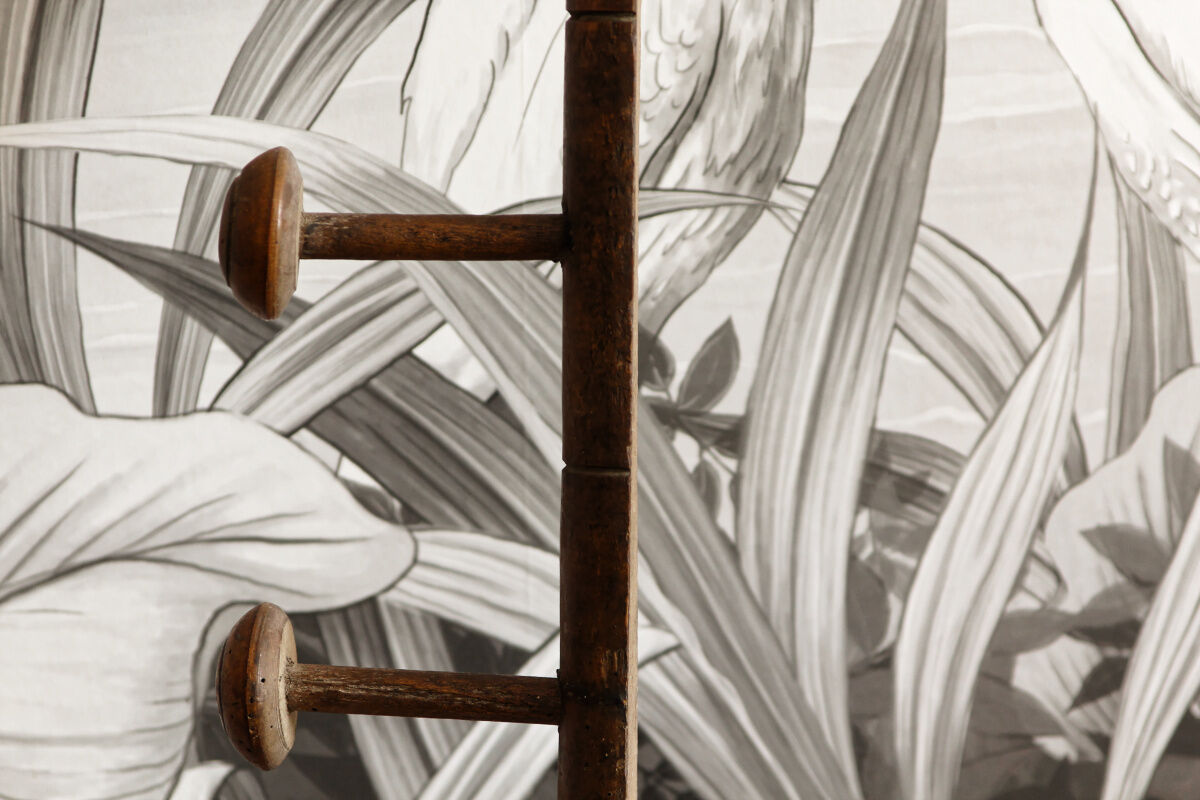 Wall mounted wooden coat rack turned