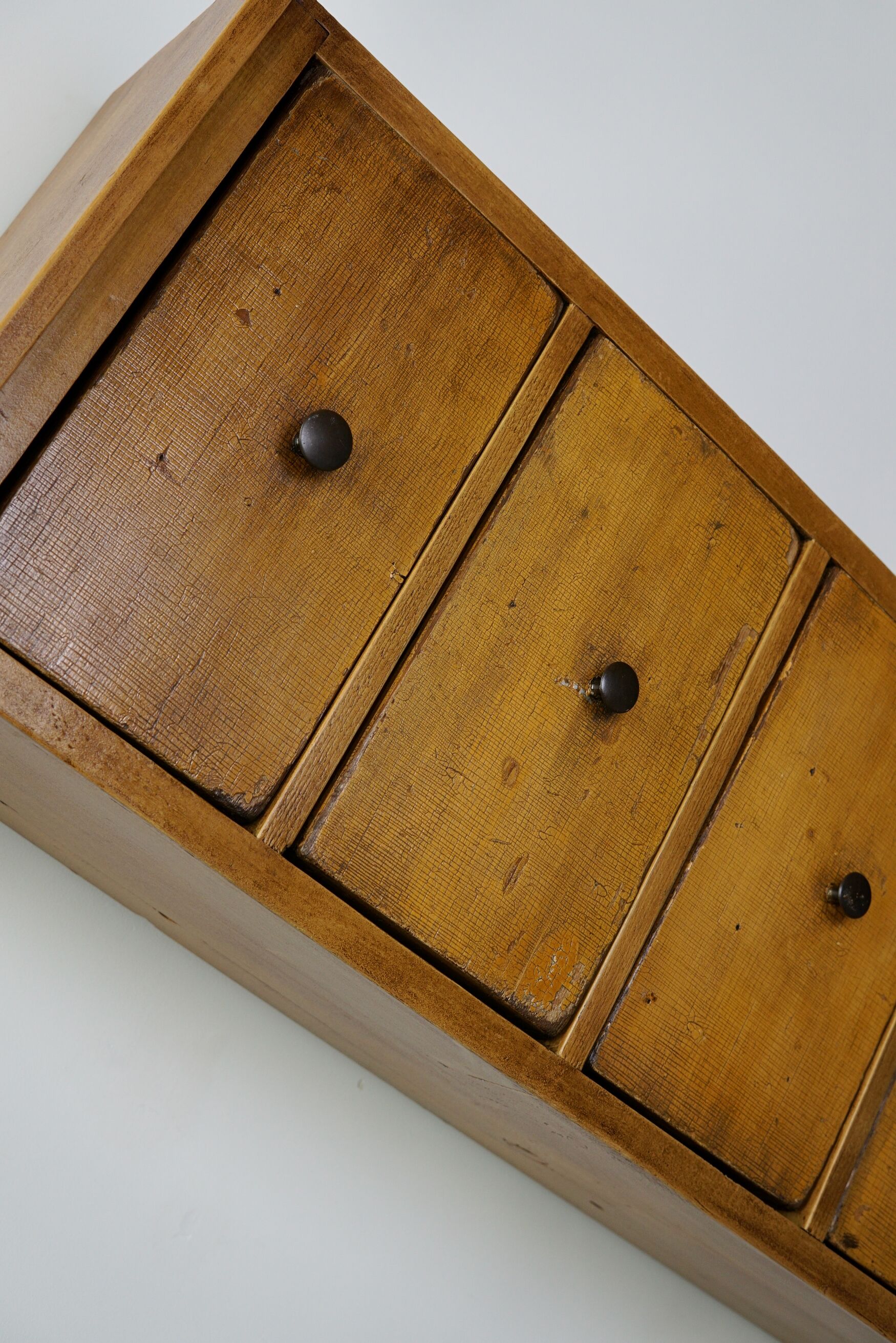 Antique dutch ochre drawer cabinet, early 20th century