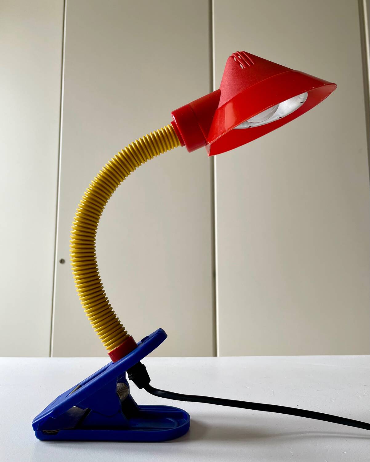 Articulated Memphis style clamp lamp