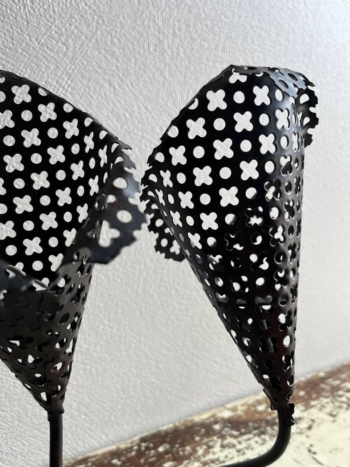 Perforated metal tealight candle holder