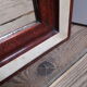 Miroir Louis Philippe H112xL76 laque bordeaux blanc crème