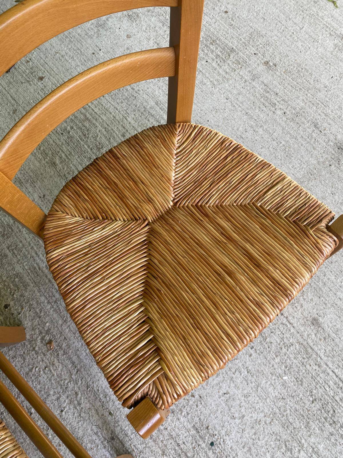 4 solid wood chairs in blond oak and straw shell