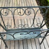Art Deco magazine rack in wrought iron with bronze patina from around 1930-1940.