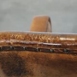 Fauteuil unique en cuir de mouton ancien