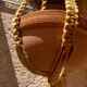 Suspension in macramé