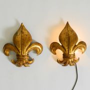 A pair of large 1970s gilt metal Fleur-de-Lis wall lamps by Hans Kögl
