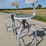 Set of 2 high workshop chairs, Nicolle model, known as whale tail