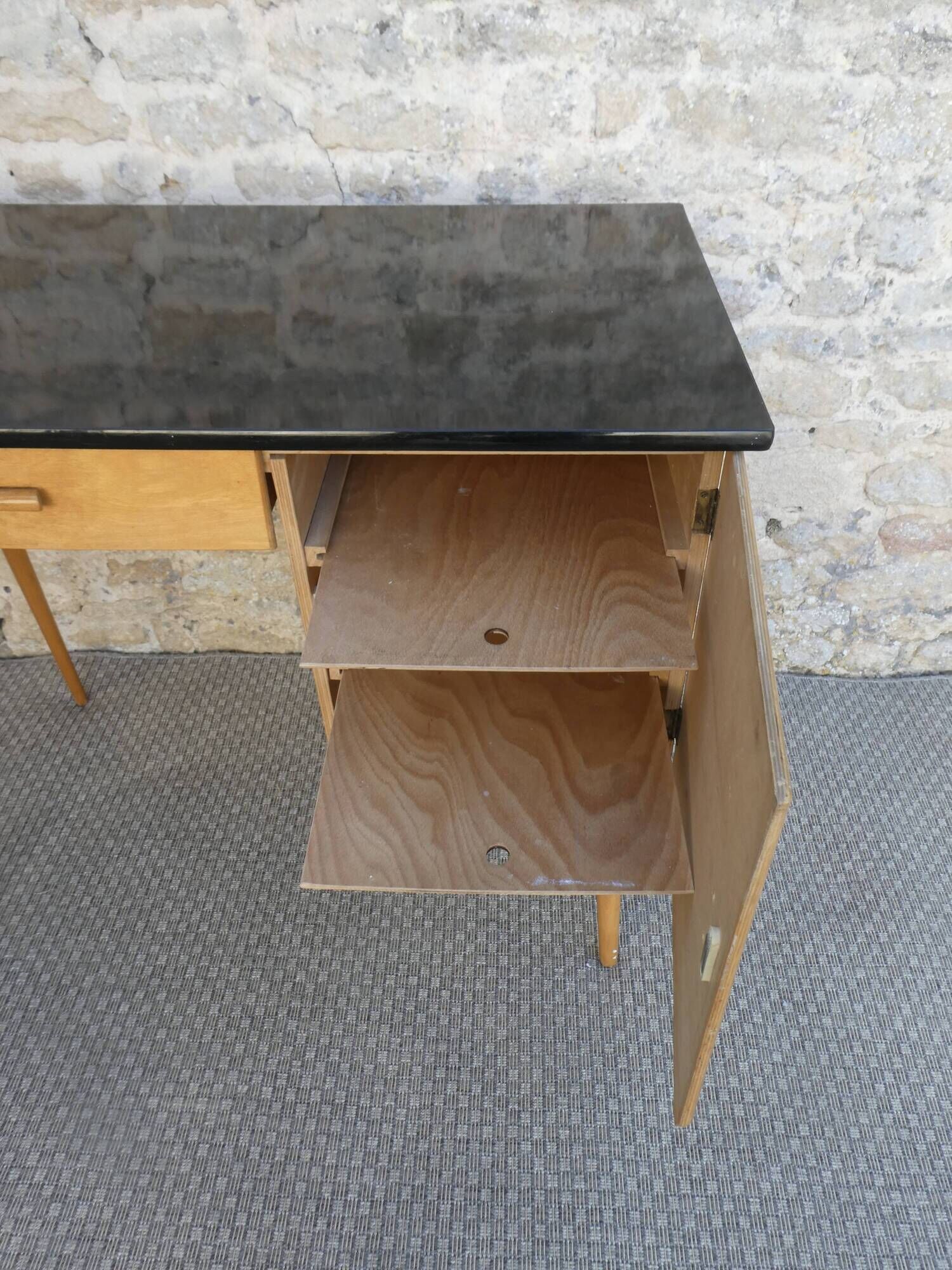 Baumann desk in light wood and black Formica, around 1960.