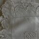 Pair of 19th century linen thread pillowcases embroidered with scallops