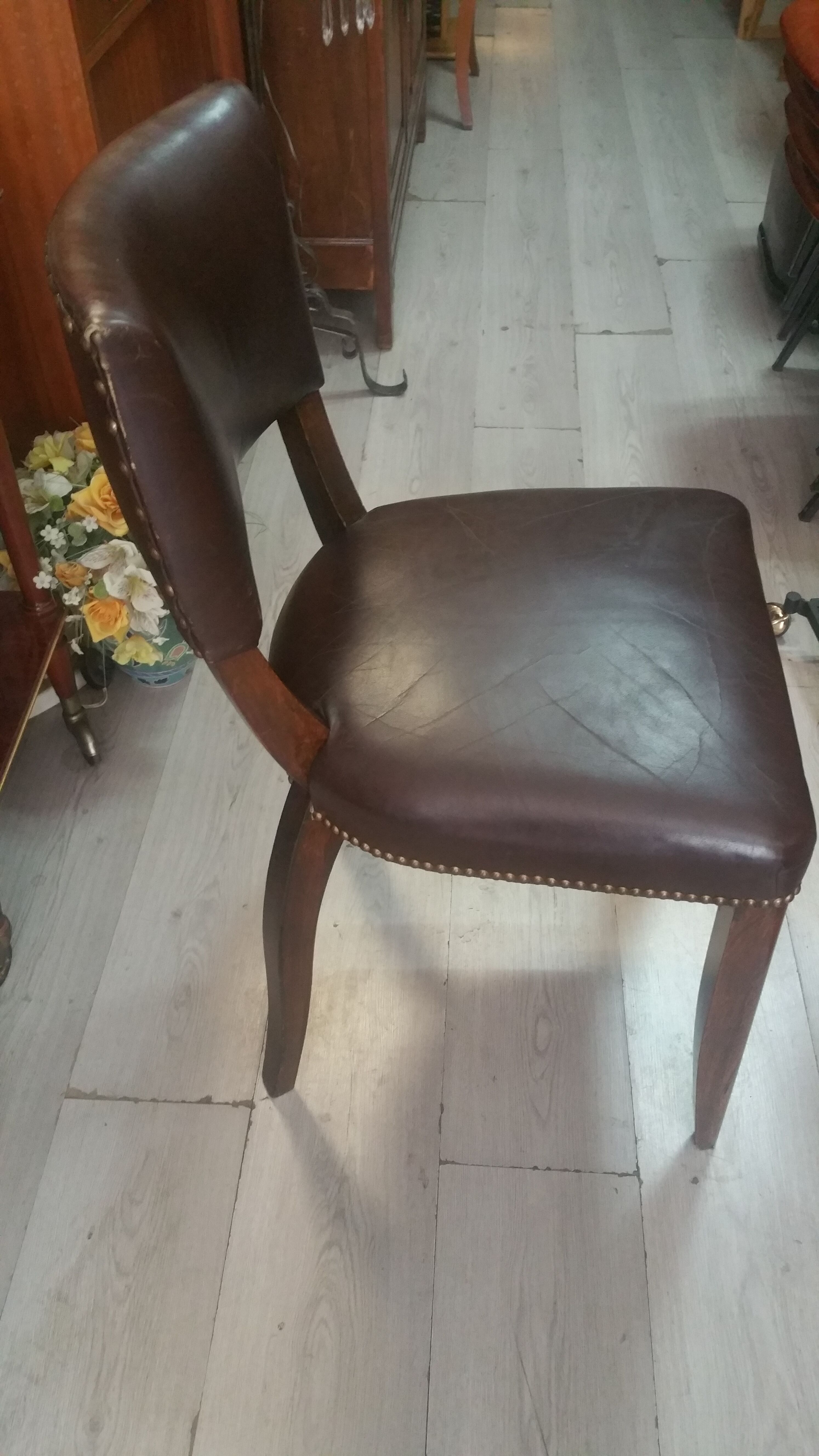 Lot of leather and vintage wood chairs