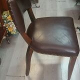 Lot of leather and vintage wood chairs