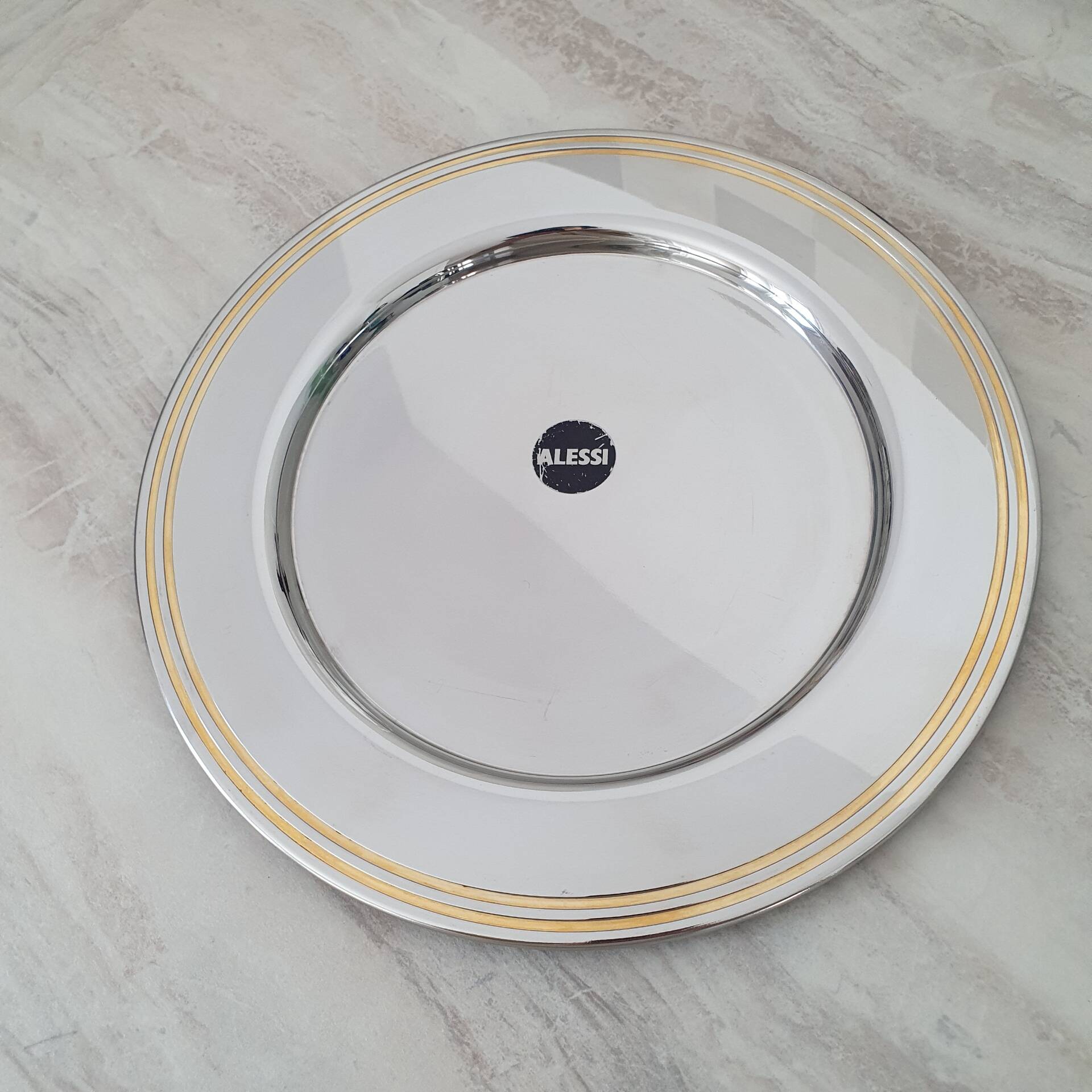 Alessi Ettore Sottsass / Serving plate stainless steel 18/10 and gold NG5100