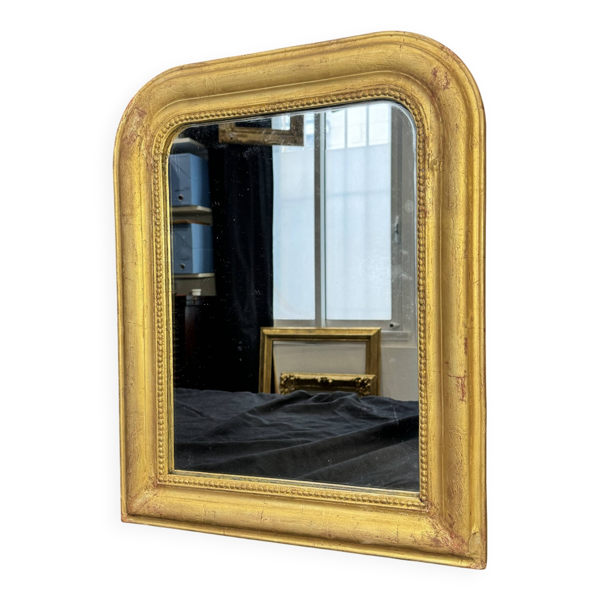 Louis-Philippe mirror gilded with gold leaf