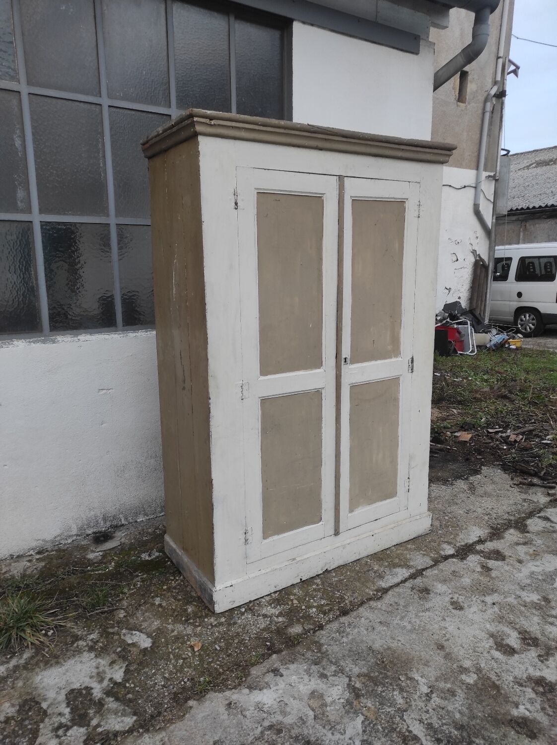 Old rustic Parisian wardrobe patinated in oak and fir