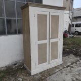 Old rustic Parisian wardrobe patinated in oak and fir