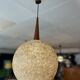Resin and teak ball pendant light