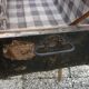 Old bulging wooden travel trunk