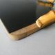 Wooden cheese board, bamboo handles, signed