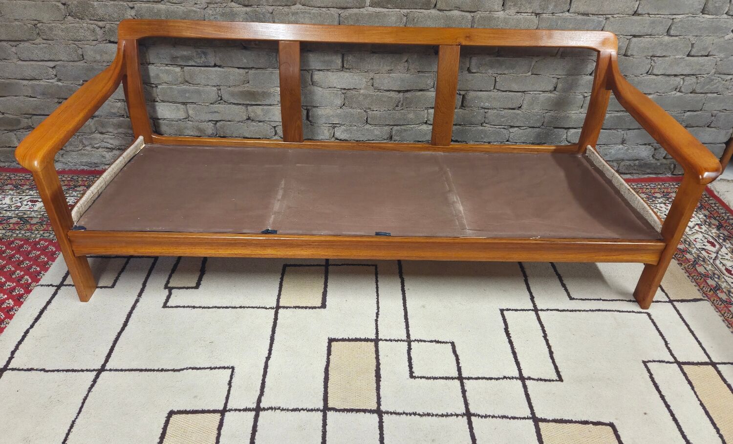 Danish canapé and its 1970s teak armchair