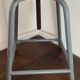 Tabouret d'atelier en métal et bois réglable en hauteur