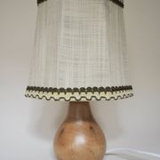 Turned wooden lamp with linen shade