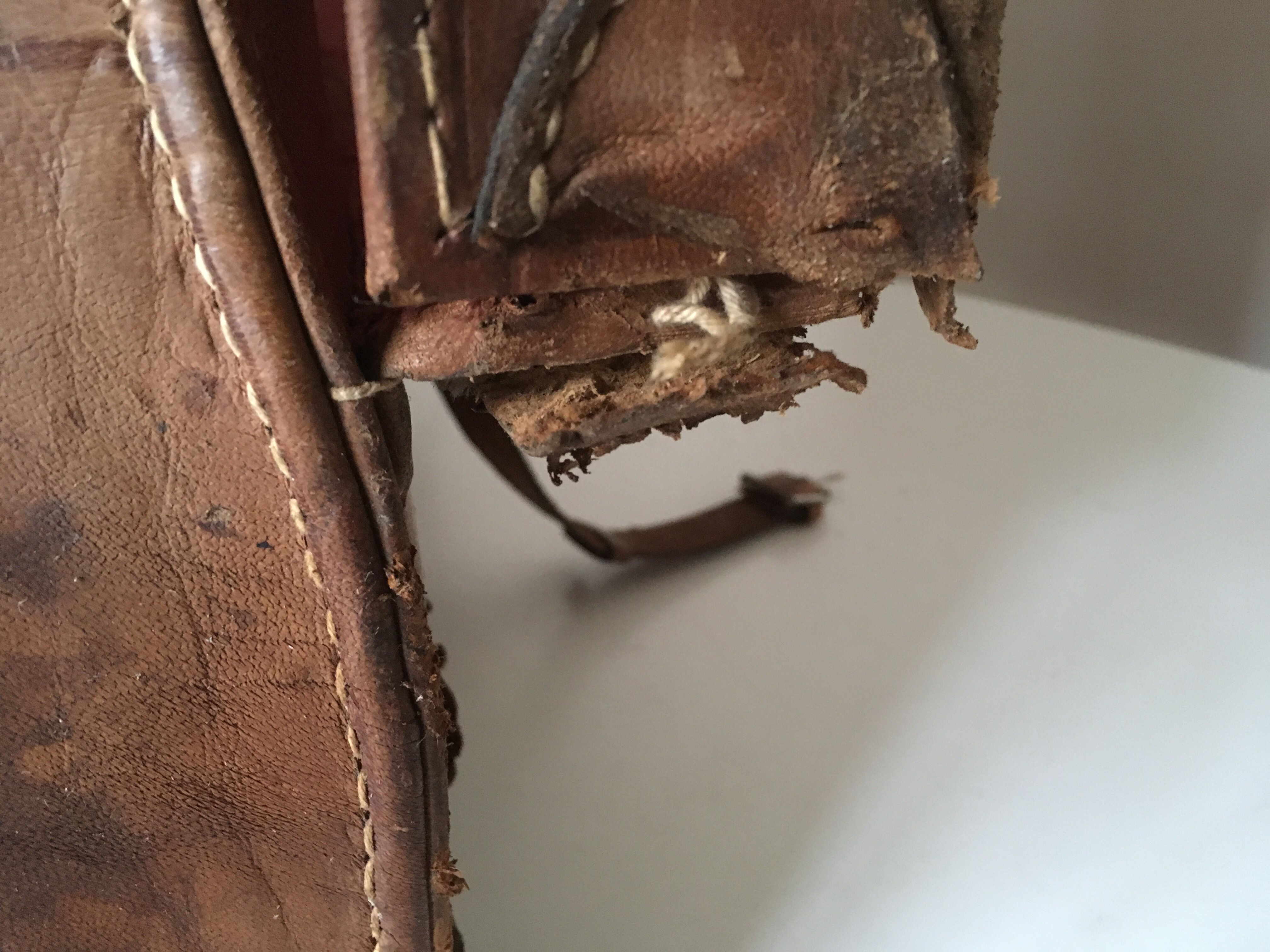 suitcase of leather with labels of palaces