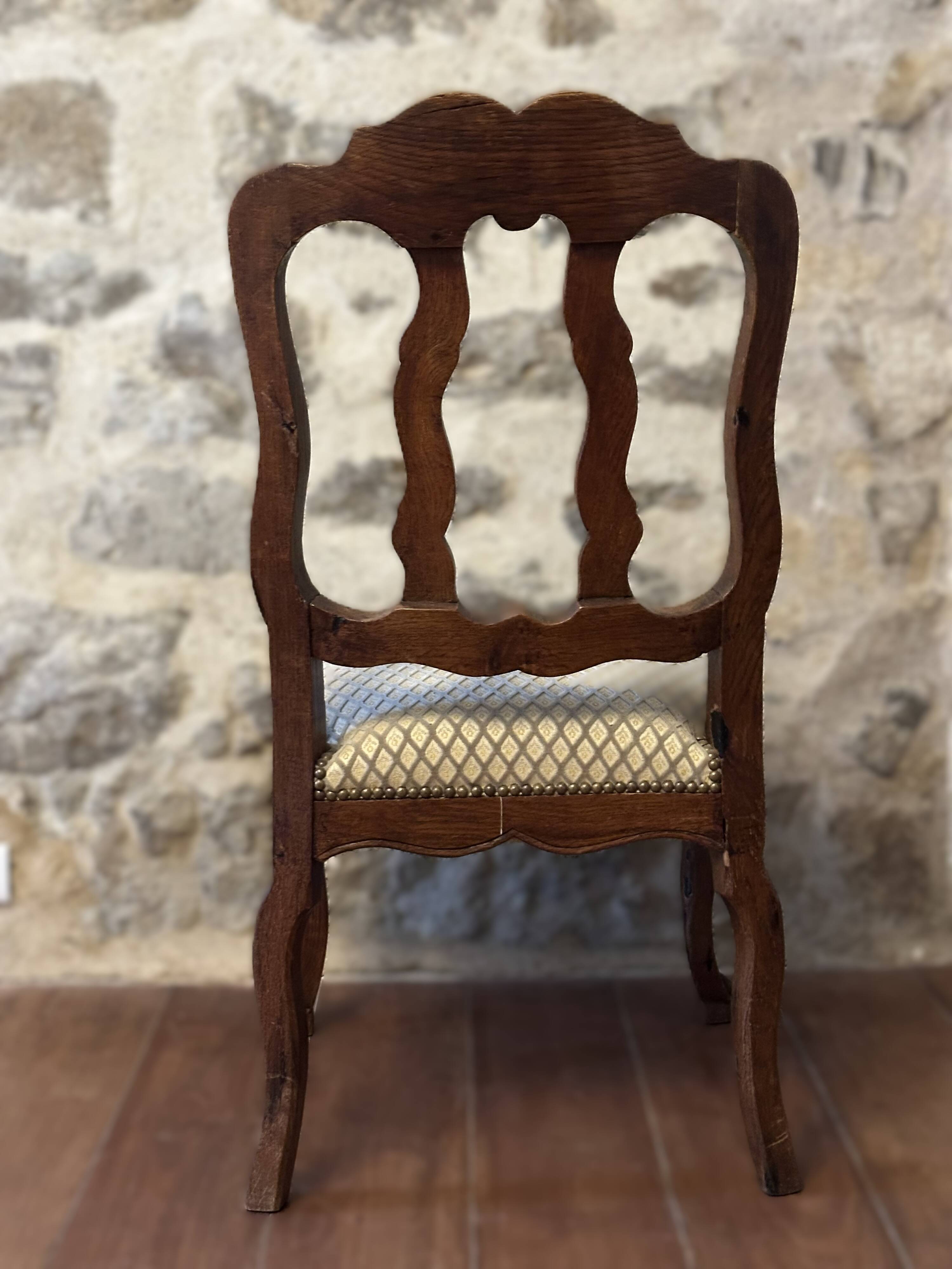 Antique dining set. Table 1.58 m x 1.10 m + 6 chairs from the 1920s.