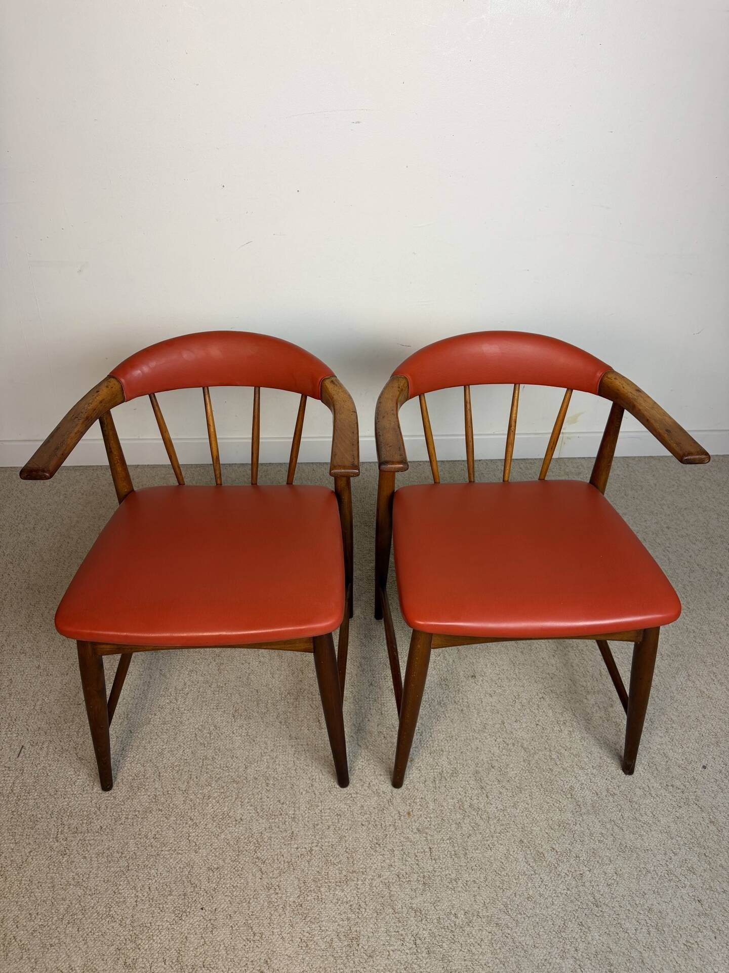 Pair of Scandinavian armchairs in teak and red faux leather – 1960s