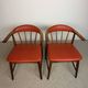 Pair of Scandinavian armchairs in teak and red faux leather – 1960s