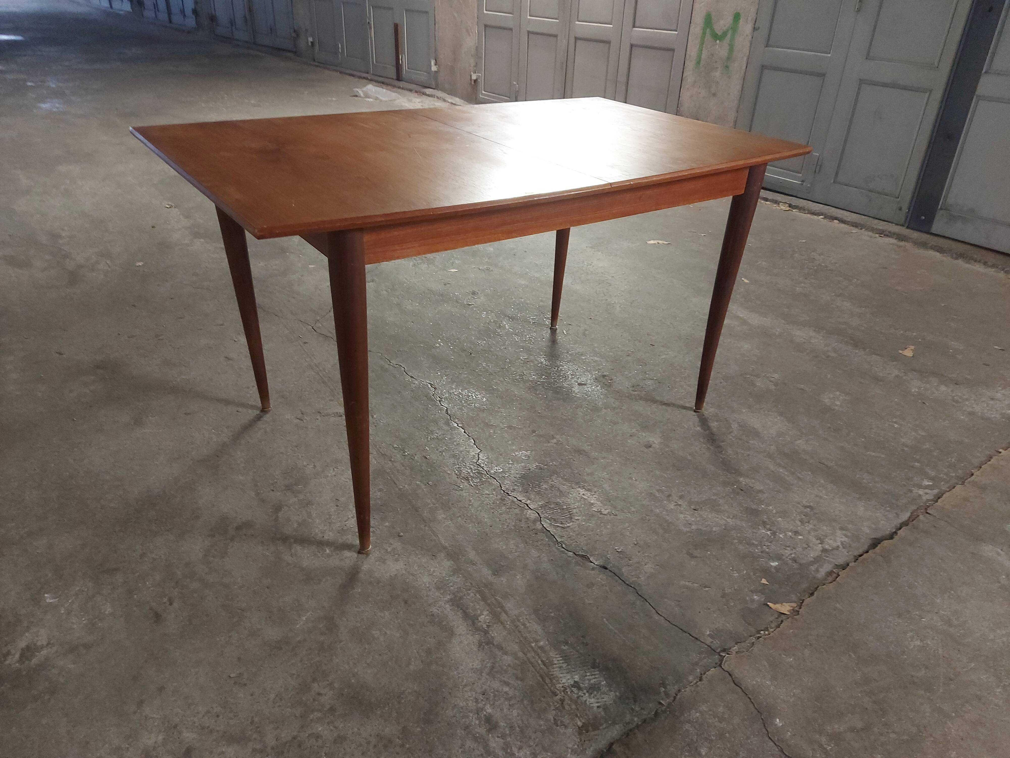 Scandinavian teak table with built-in extension