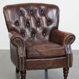 Classic grained cognac colored cowhide leather Chesterfield armchair