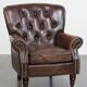 Fauteuil Chesterfield classique en cuir de vachette grainé couleur cognac
