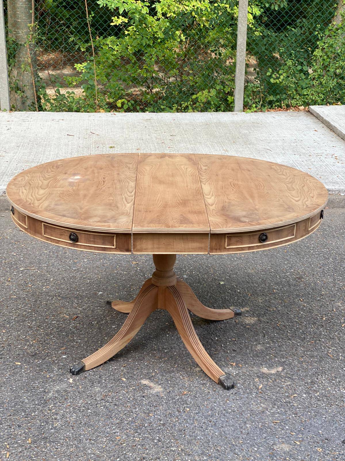 Round extendable dining table Regency central leg stripped mahogany 1960