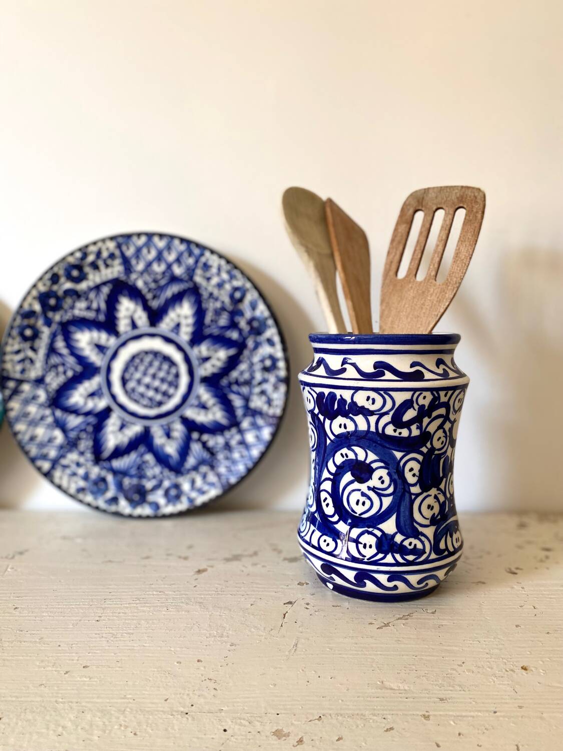 Small amphora vase in old hand-painted ceramic