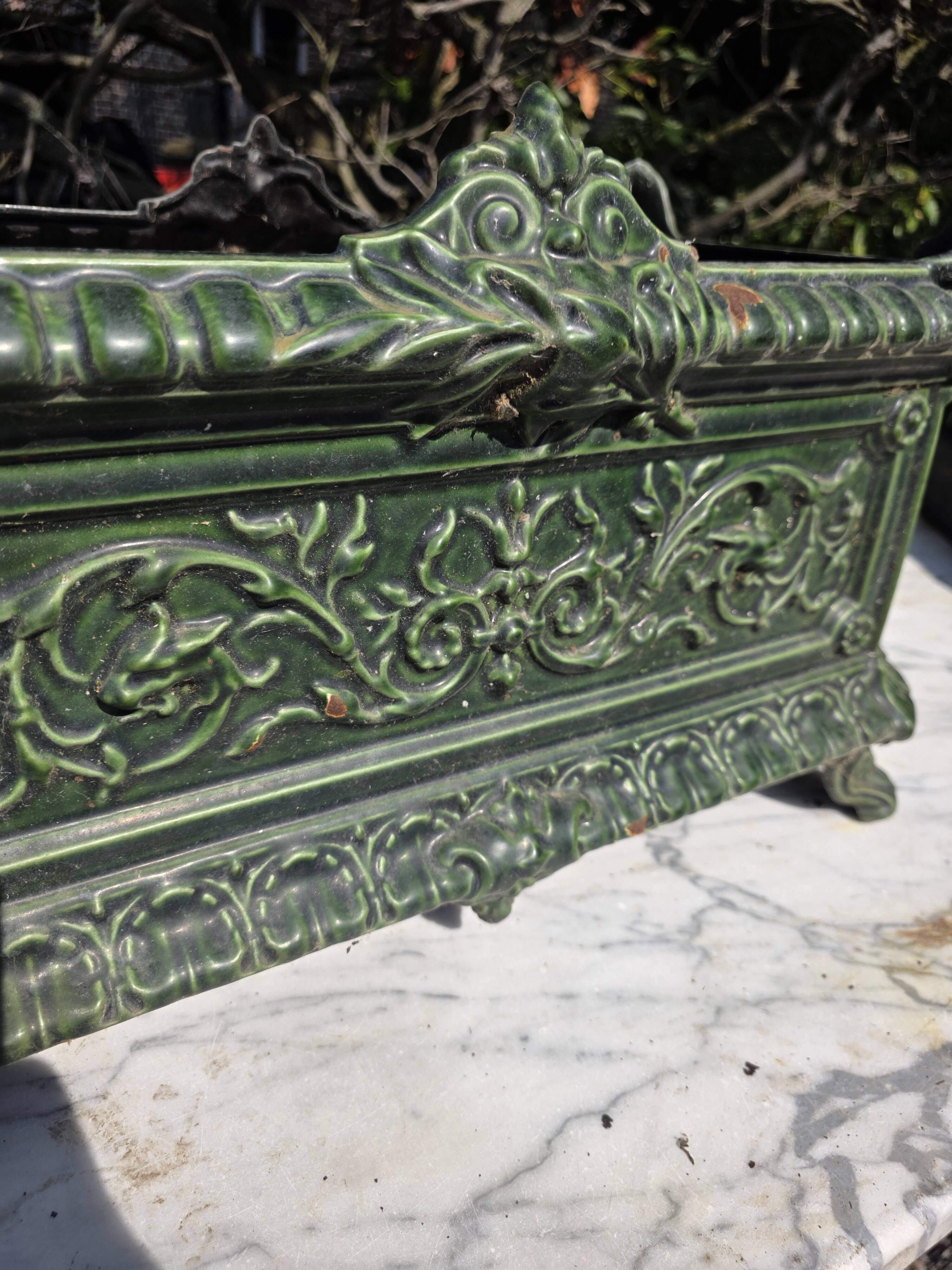Antique enamelled cast iron planter in the Napoleon III style.