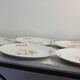 Porcelain flat plates with floral decoration