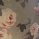 Set of two toad-shaped sofas covered in floral fabric.