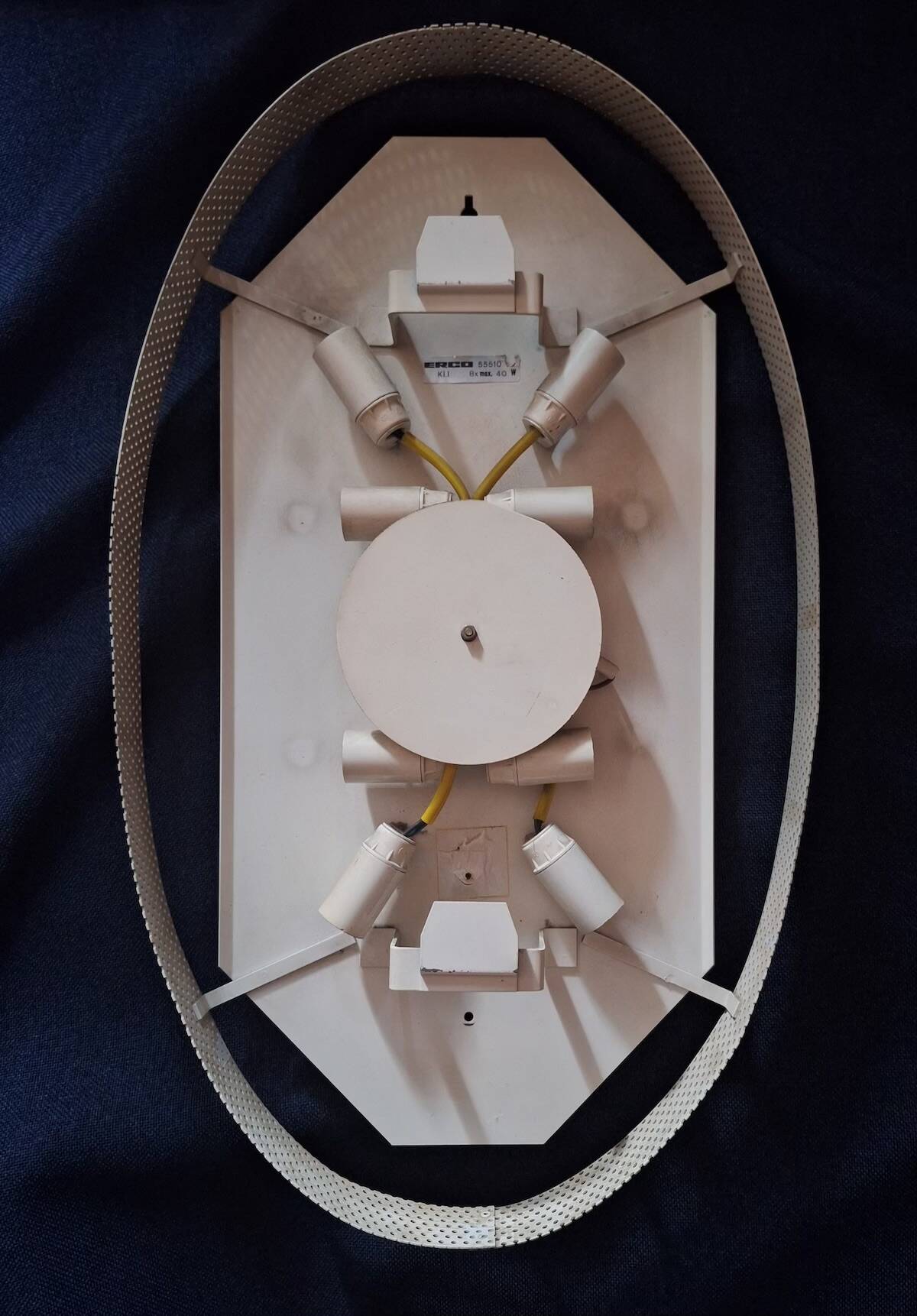 Erco large oval wall light with mirror in melted ice acrylic, 1970s