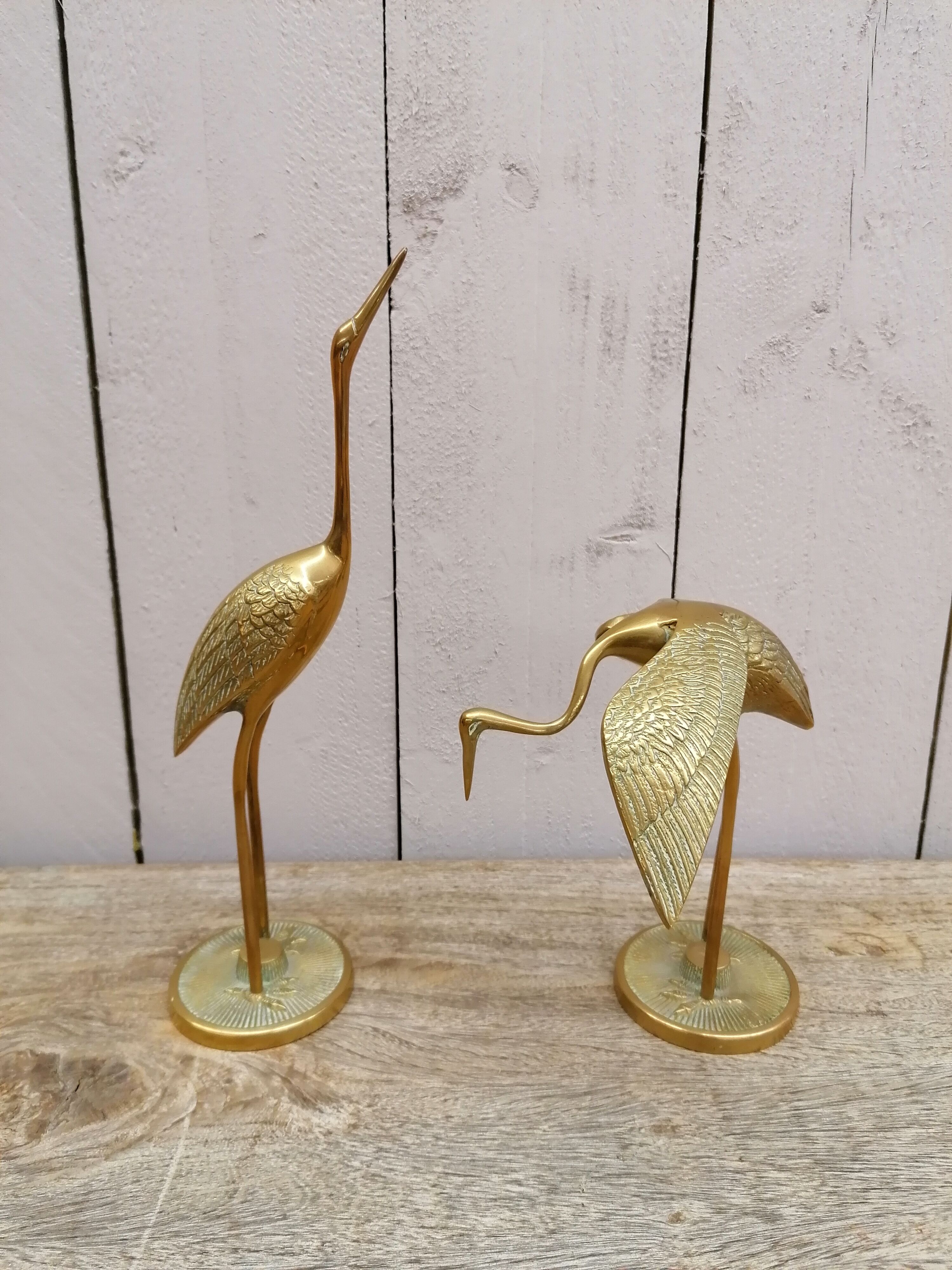 Pair of brass herons