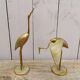 Pair of brass herons