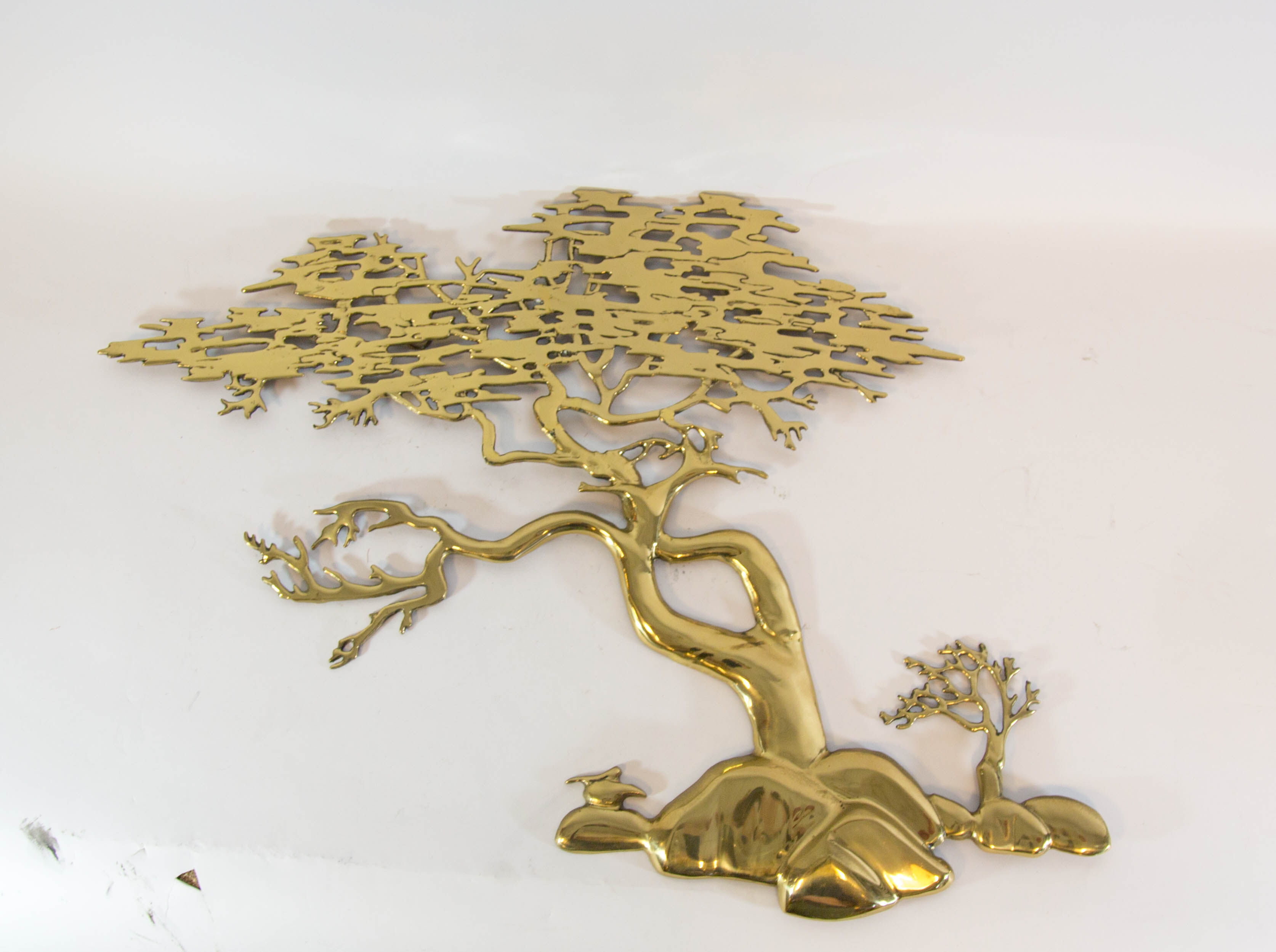 Brass wall sculpture