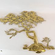 Brass wall sculpture